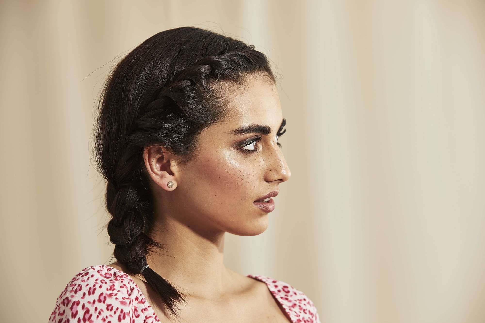 Side braid on shoulder length brown hair