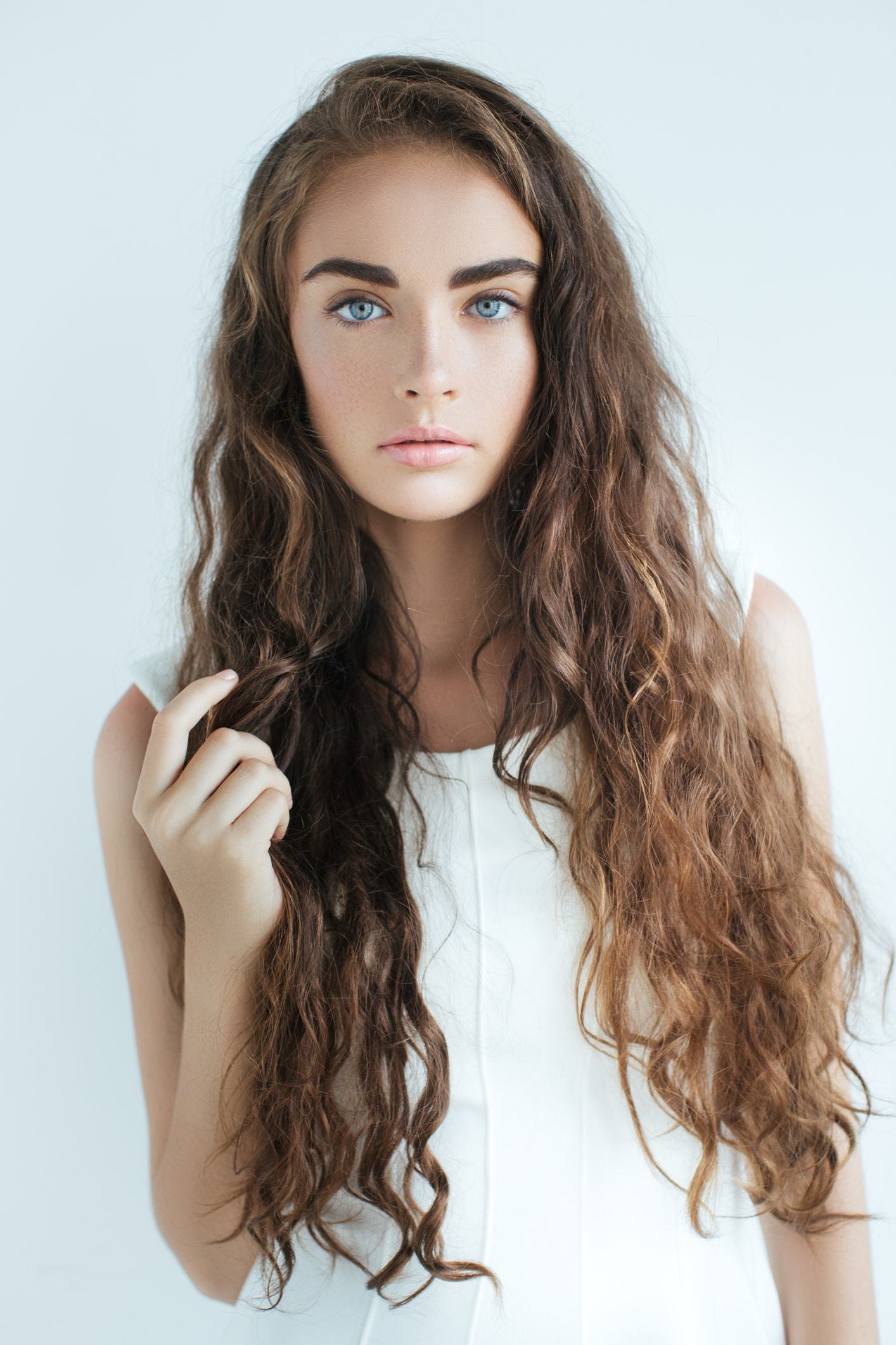 spiral perm long loose brown curls