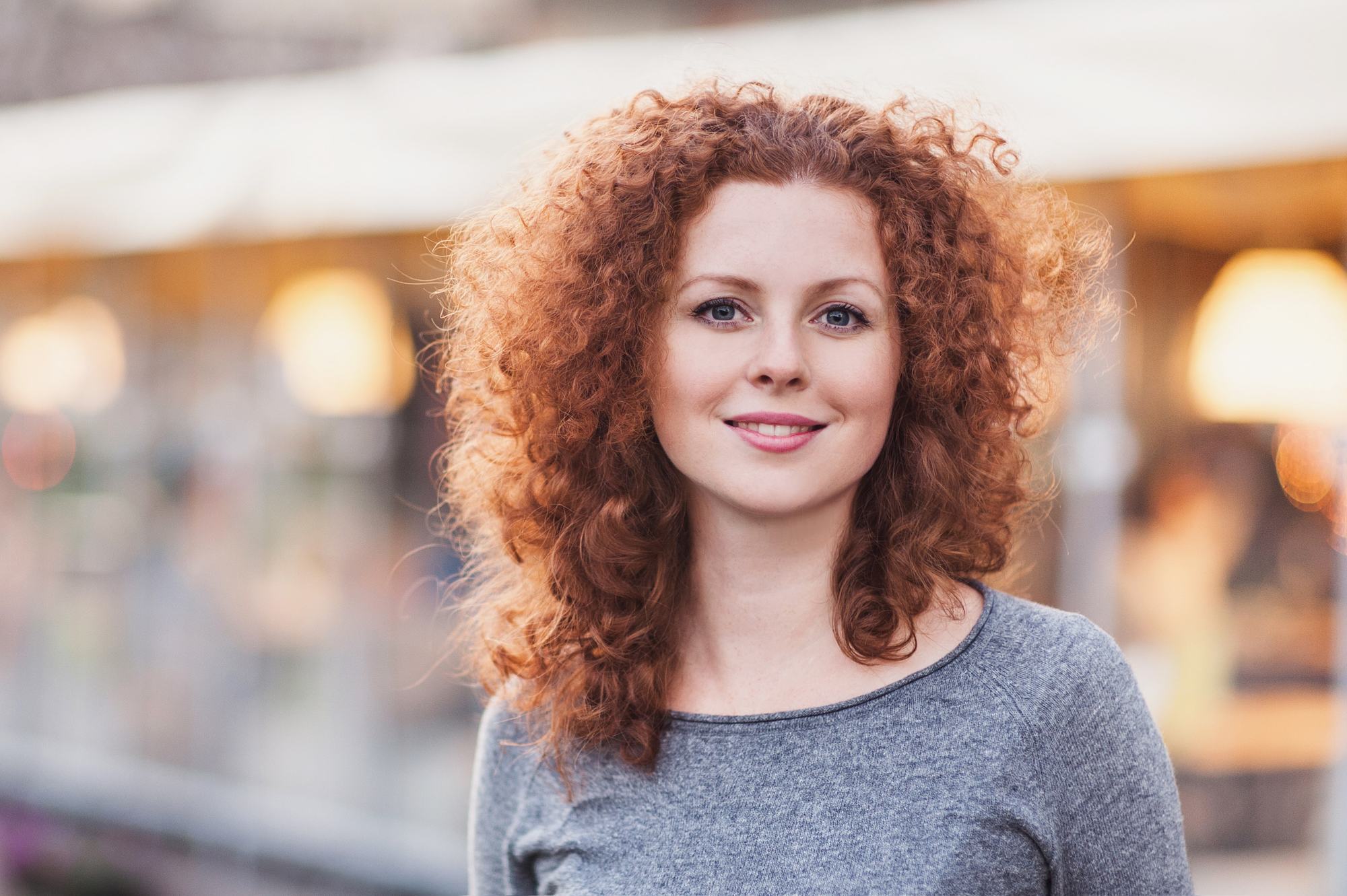 spiral perm red frizzy curls