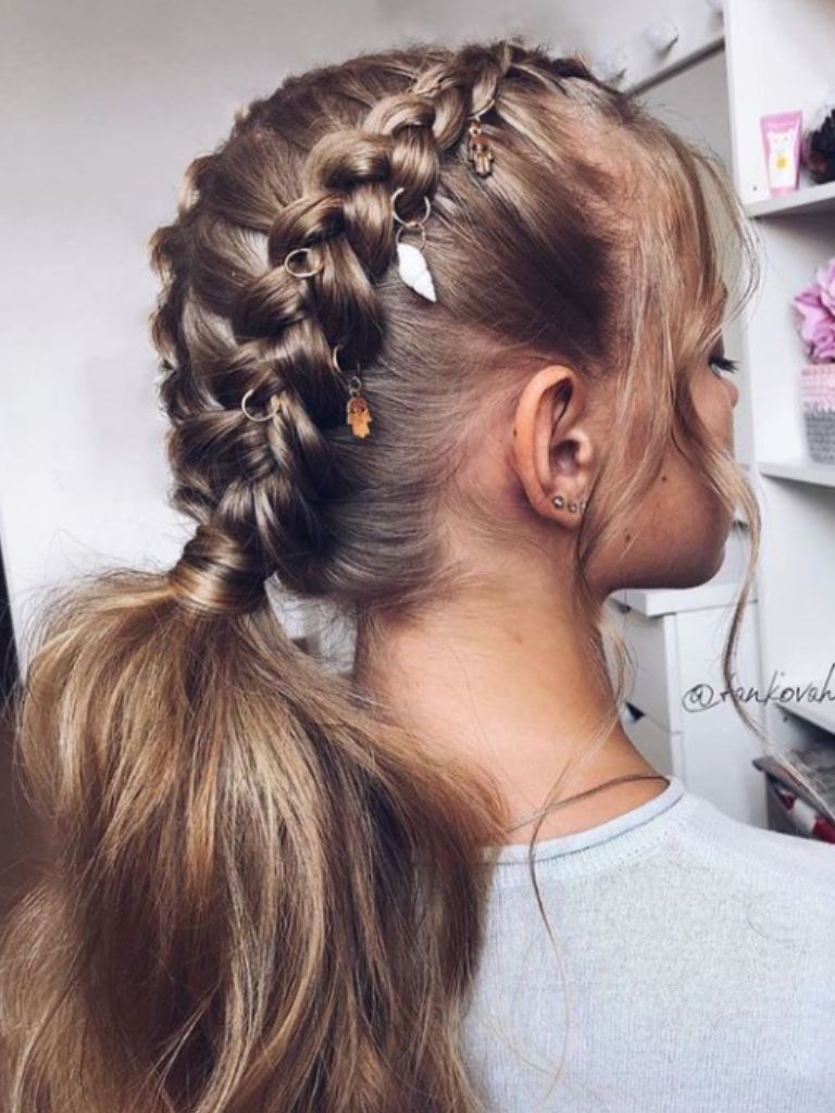 Woman with Dutch braids and ponytail