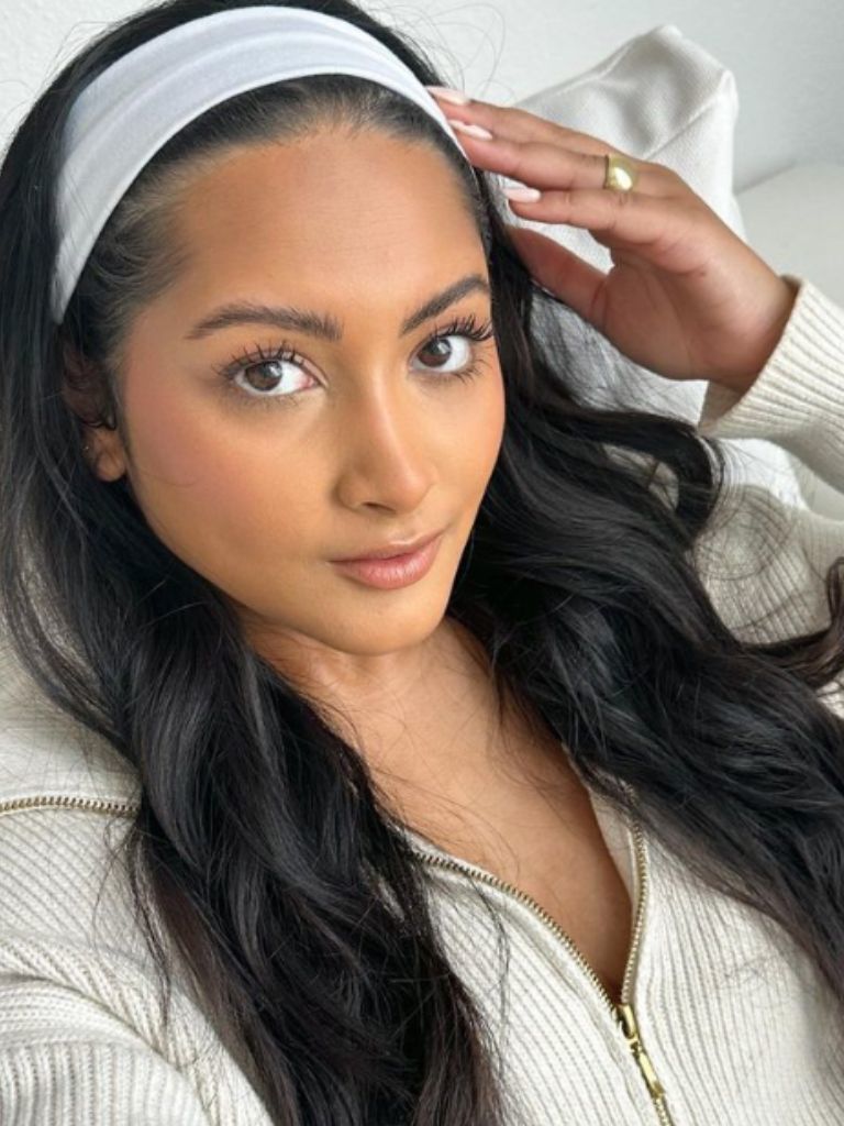 Woman with headband and long black hair