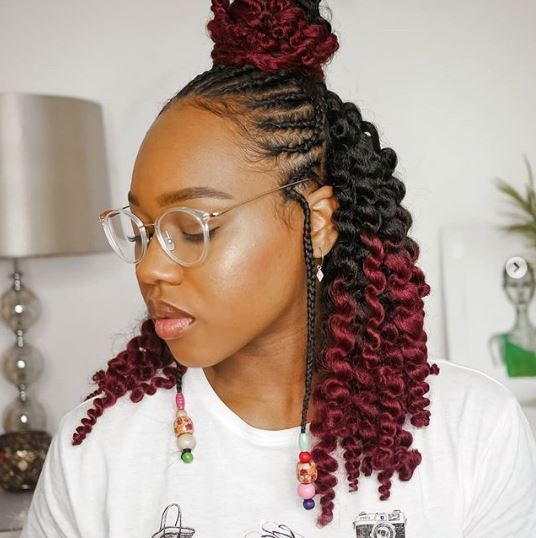 Woman with burgundy cornrow kinky twists