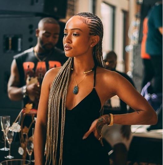 Karrueche with long cornrow micro braids