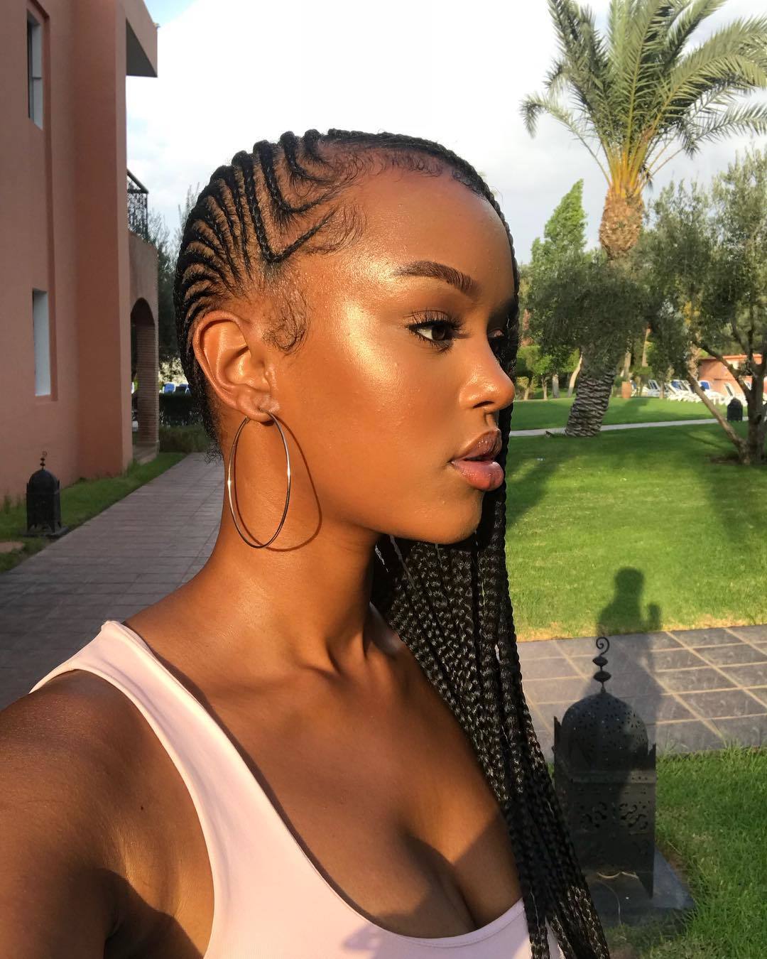 Woman with side cornrows