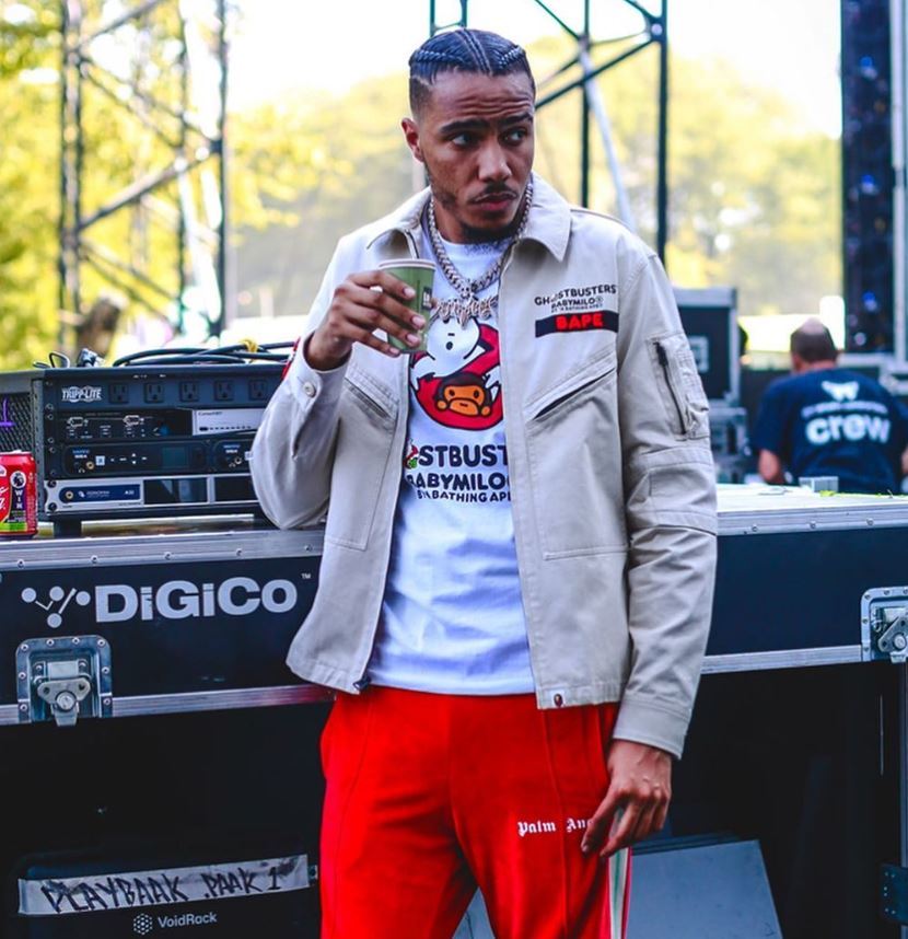 AJ Tracey with hair in braids