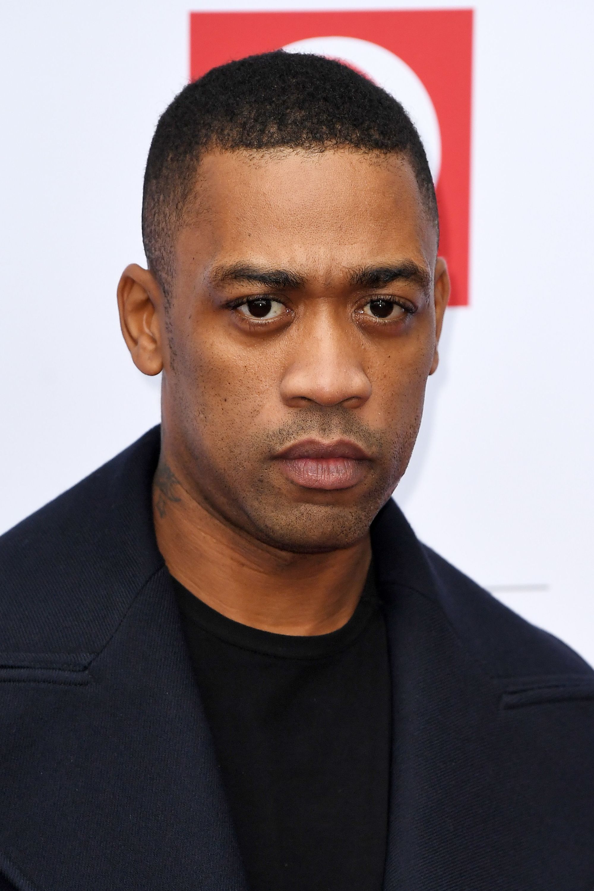 Wiley with tapper fade shaved haircut