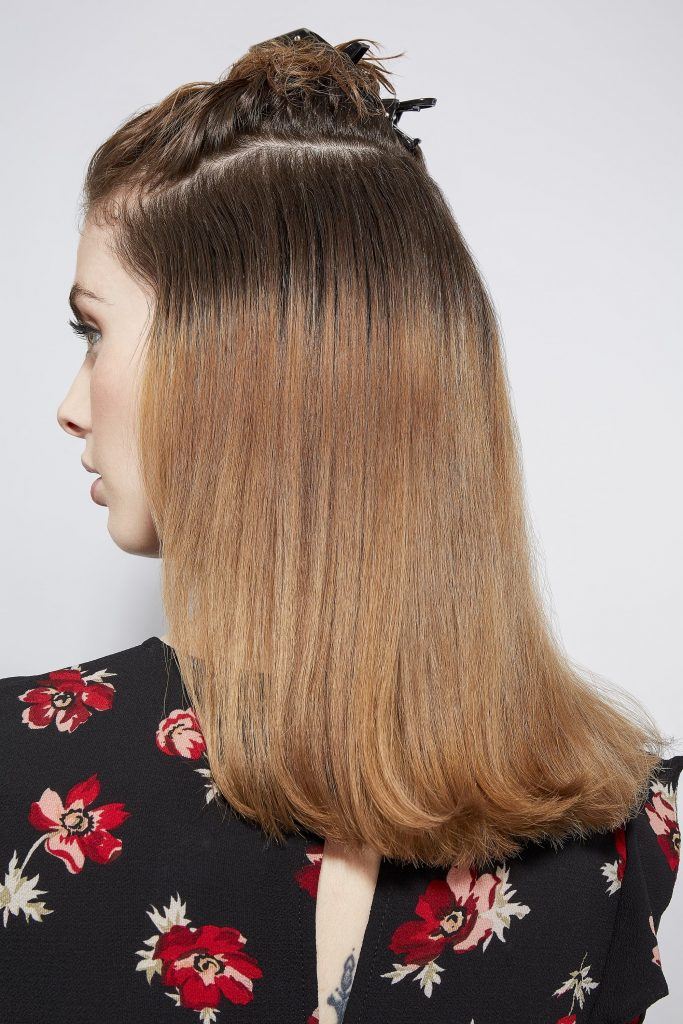 Woman with section shoulder length hair