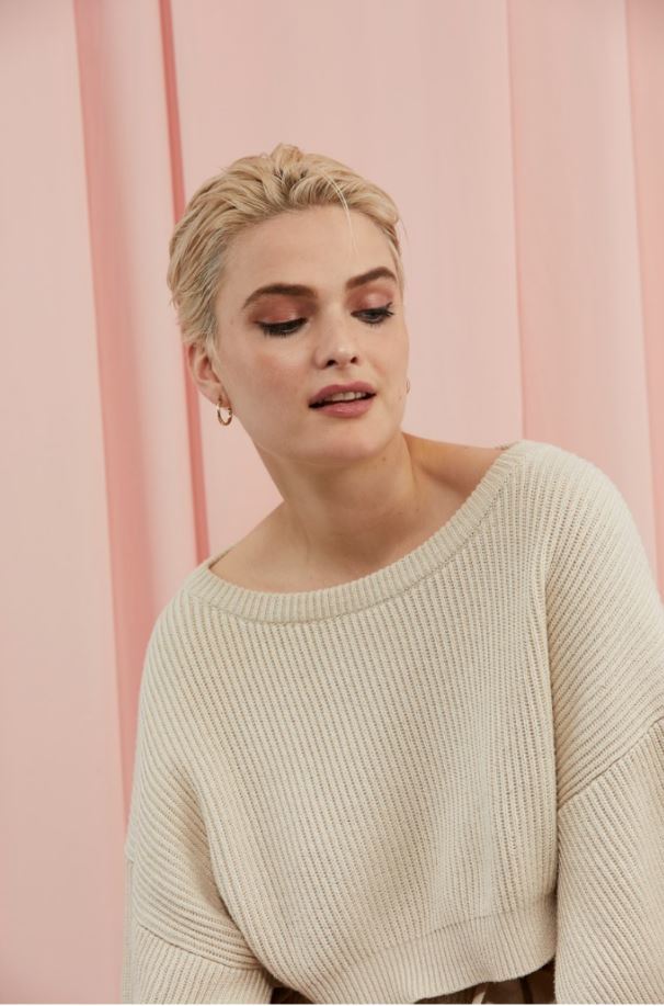 Blonde woman with sleek hair