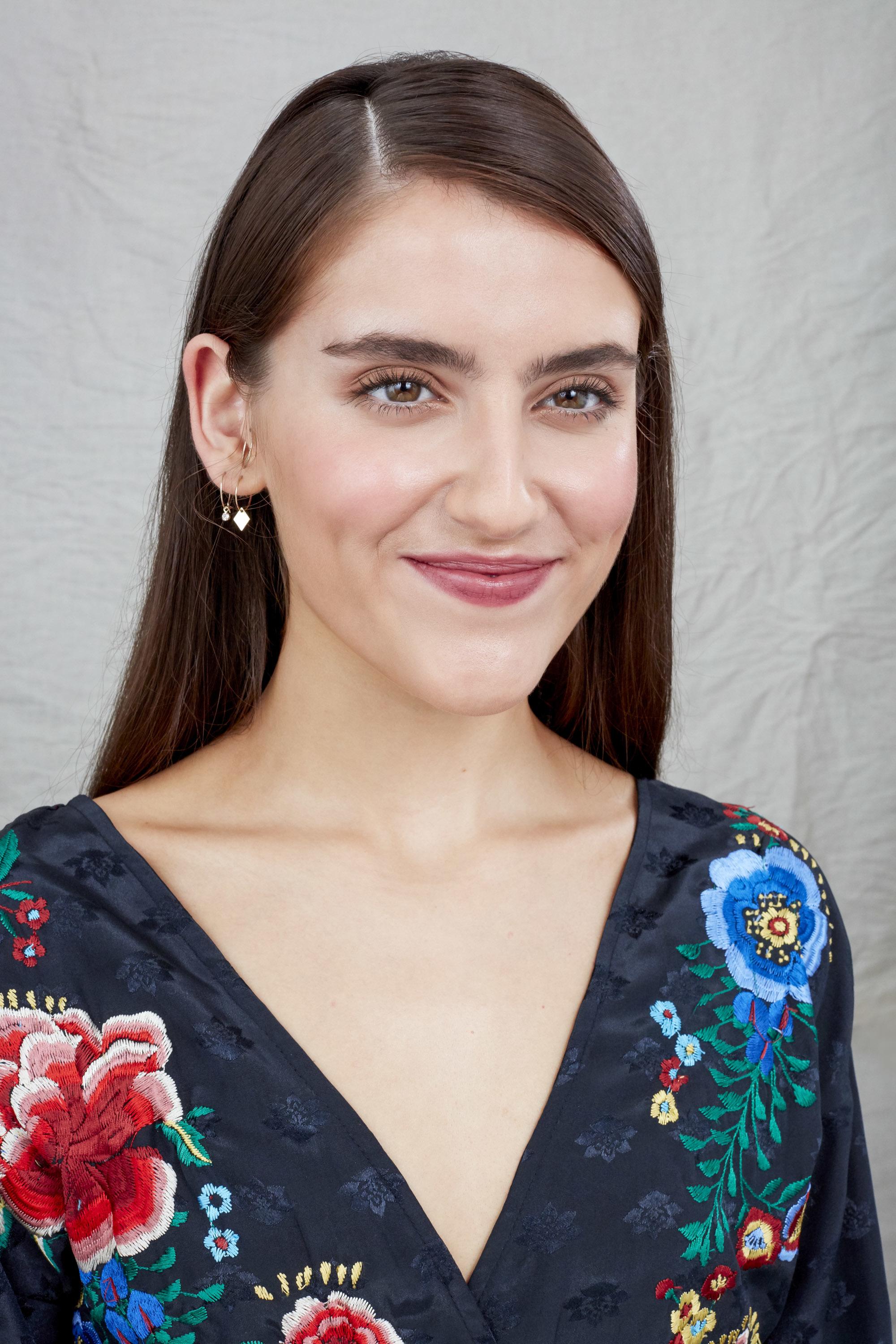 Smiling brunette with side parting