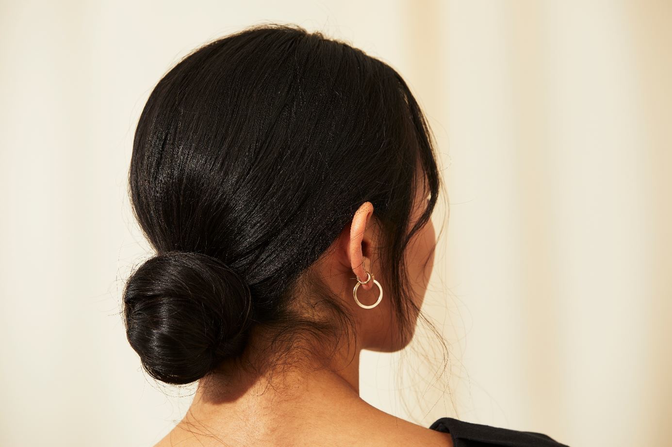 back view of a woman with a bun
