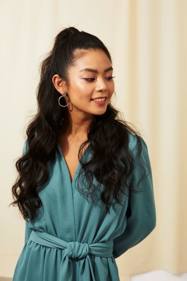 Young Asian woman with half up bun