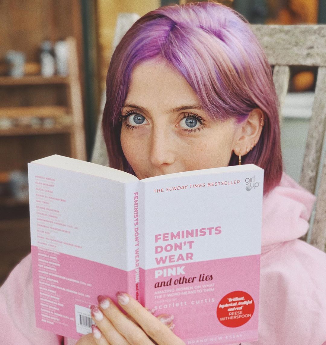 Scarlett Curtis holding her book “Women Don't Wear Pink”