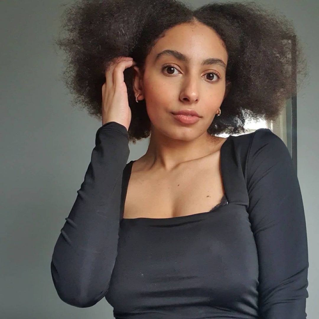 Woman with brunette natural hair