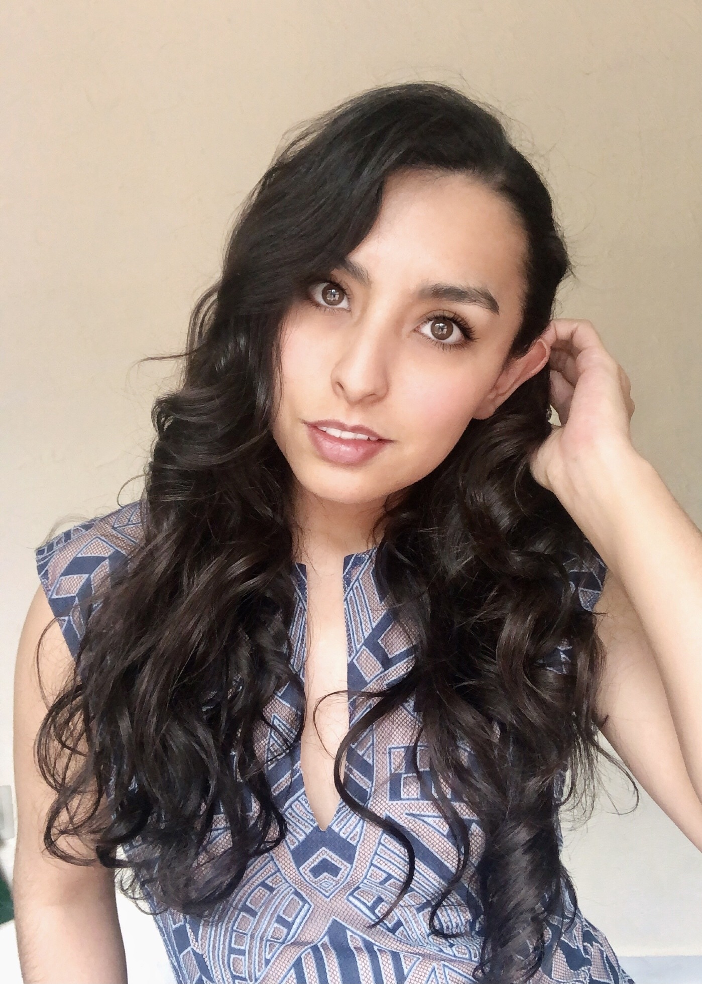 woman with long curly dark brown hair