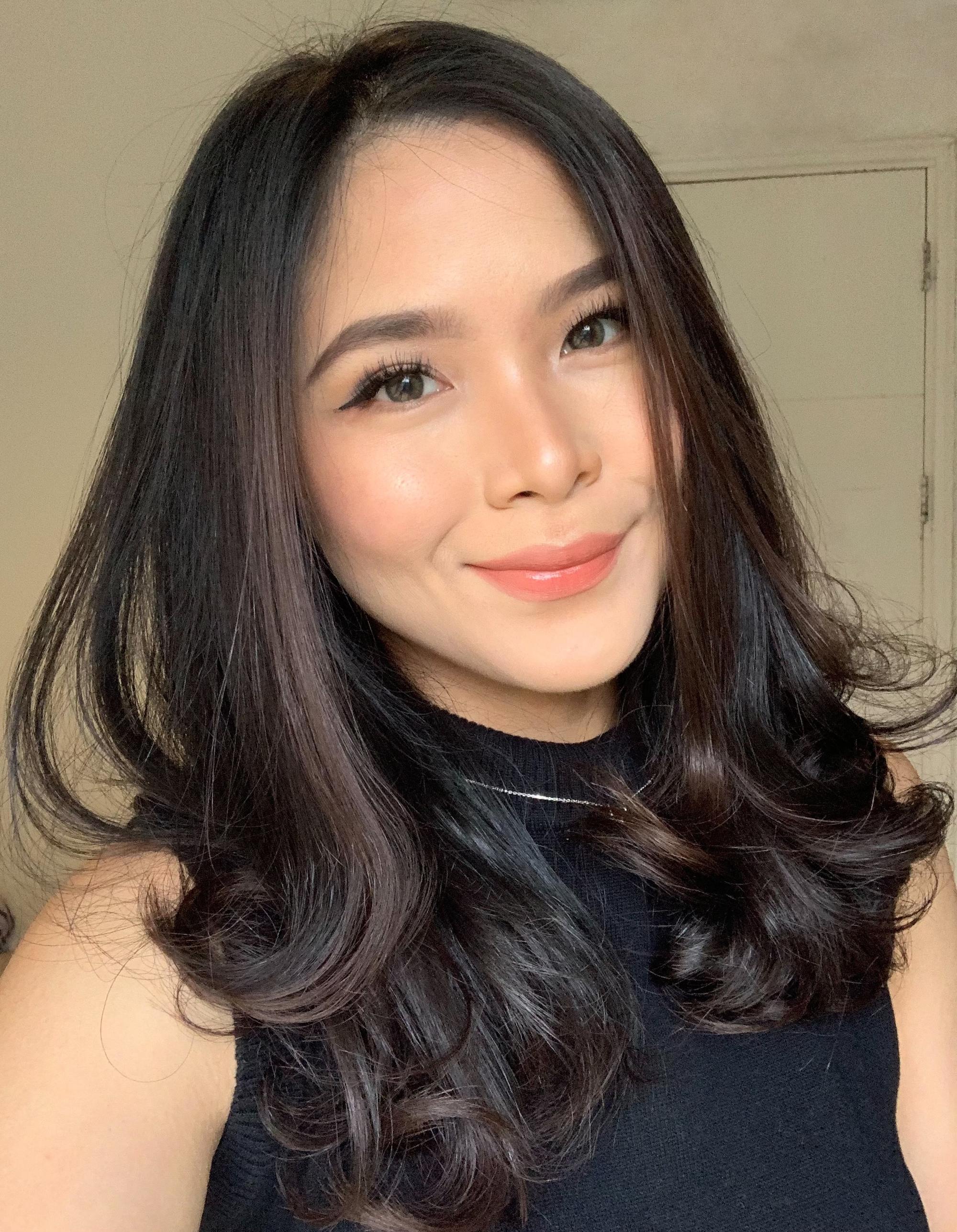 woman with dark brown long wavy hair