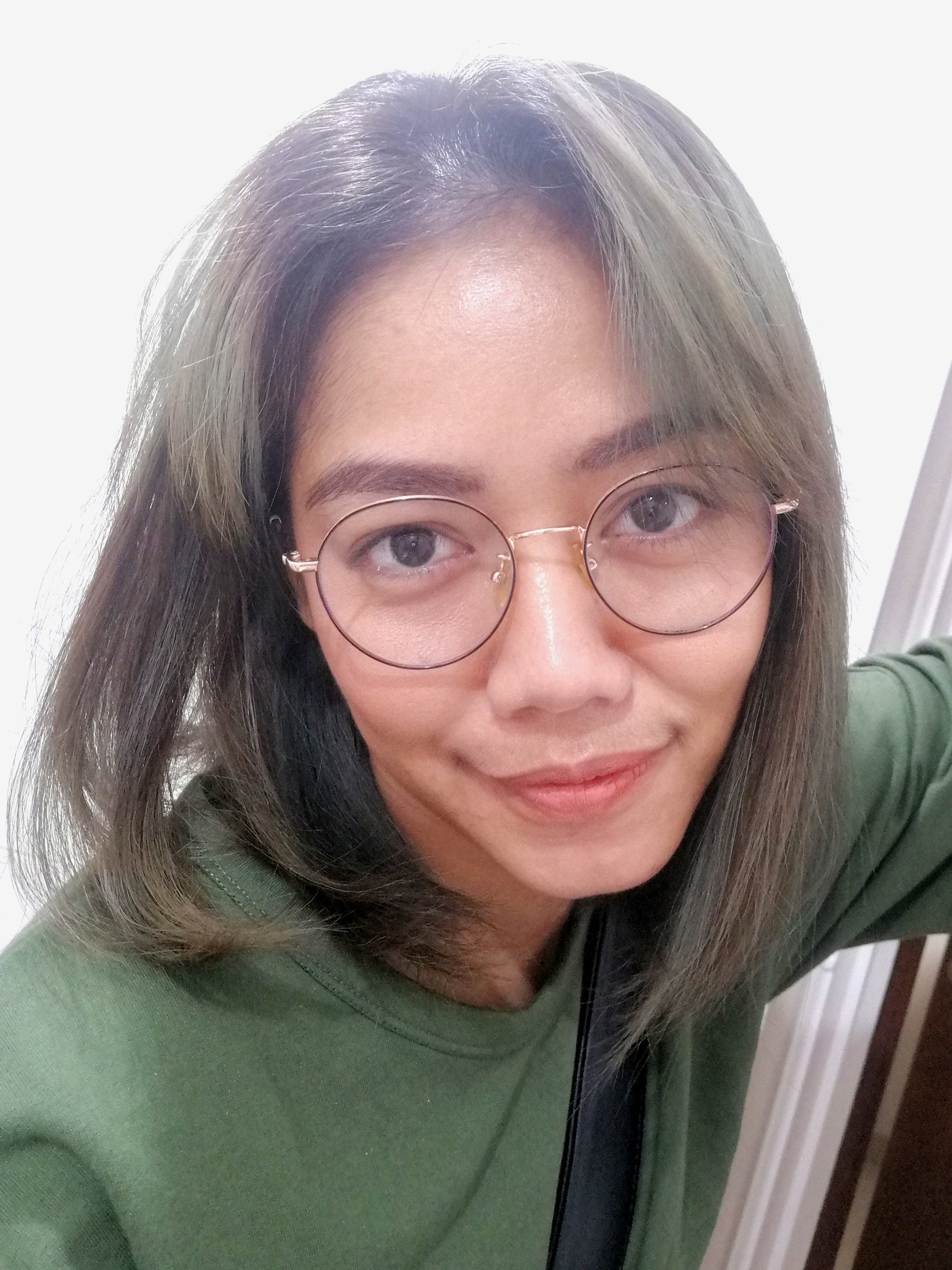woman with ash brown hair in a bob style