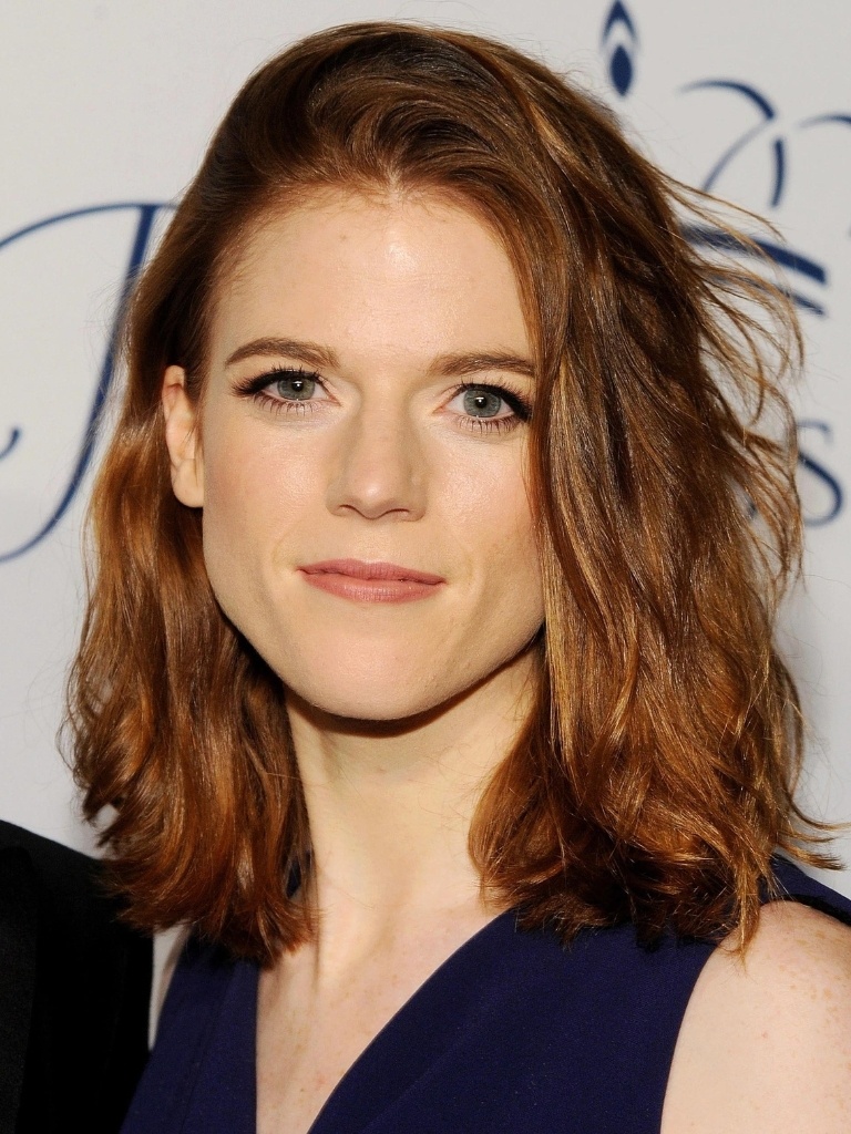 Rose Leslie with an auburn wavy lob