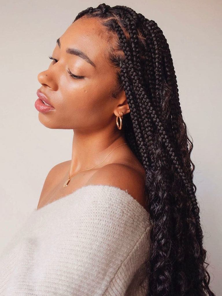 Black woman with beautiful long curly box braids
