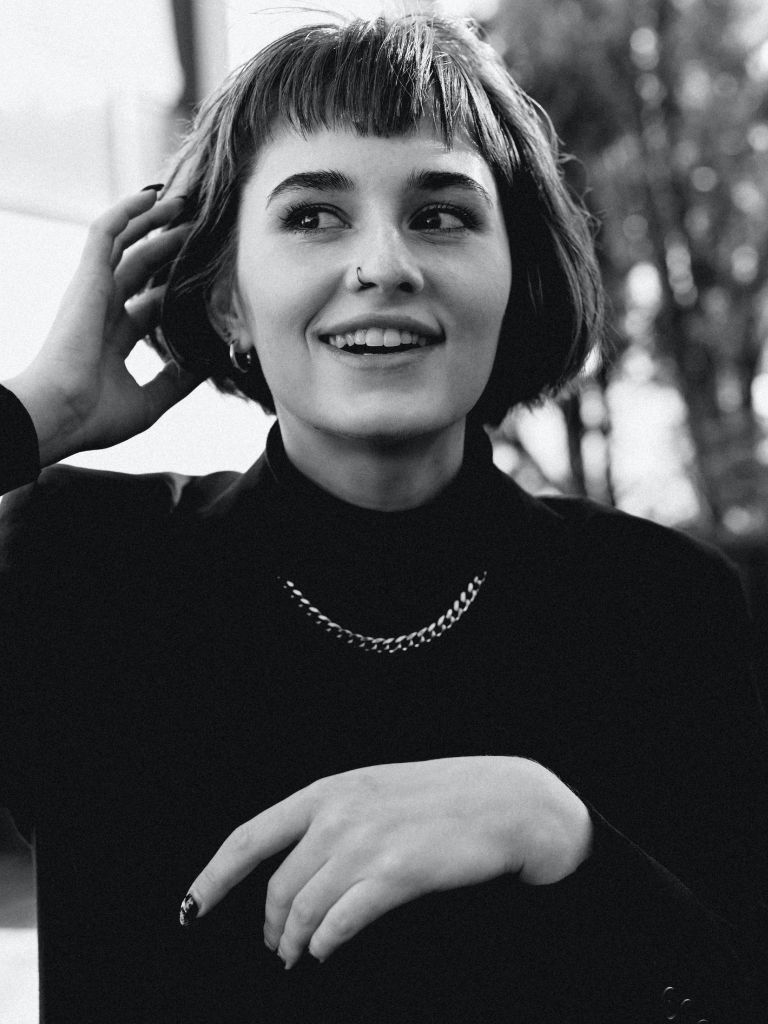 Woman with relaxed sleek French Bob.