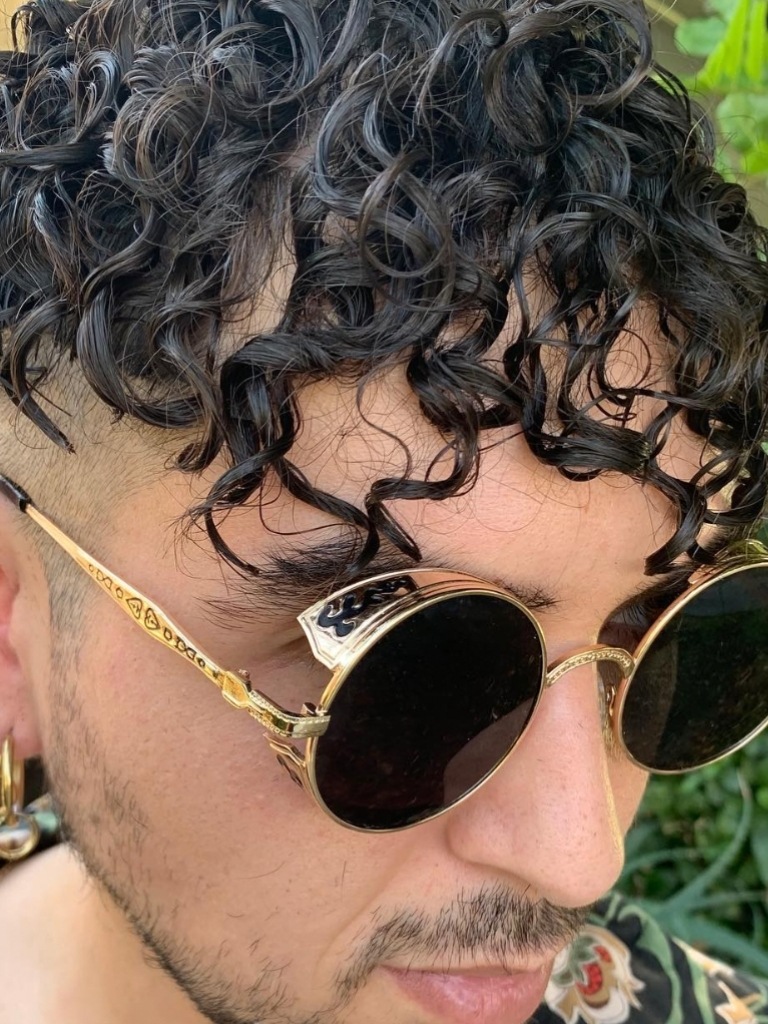 Man with black loose hair