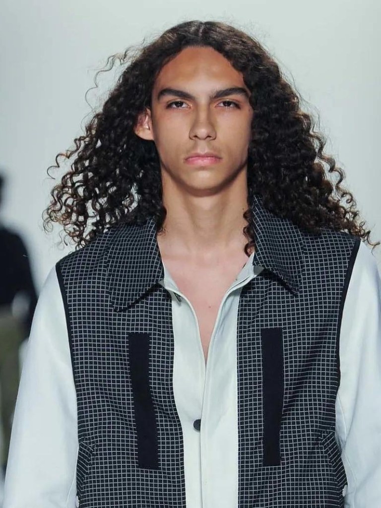 Permed hair: All Things Hair - IMAGE - man with long brown curly hair