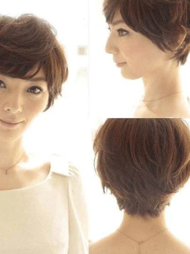 Asian hairstyles: Asian woman with short layered light brown pixie hair.