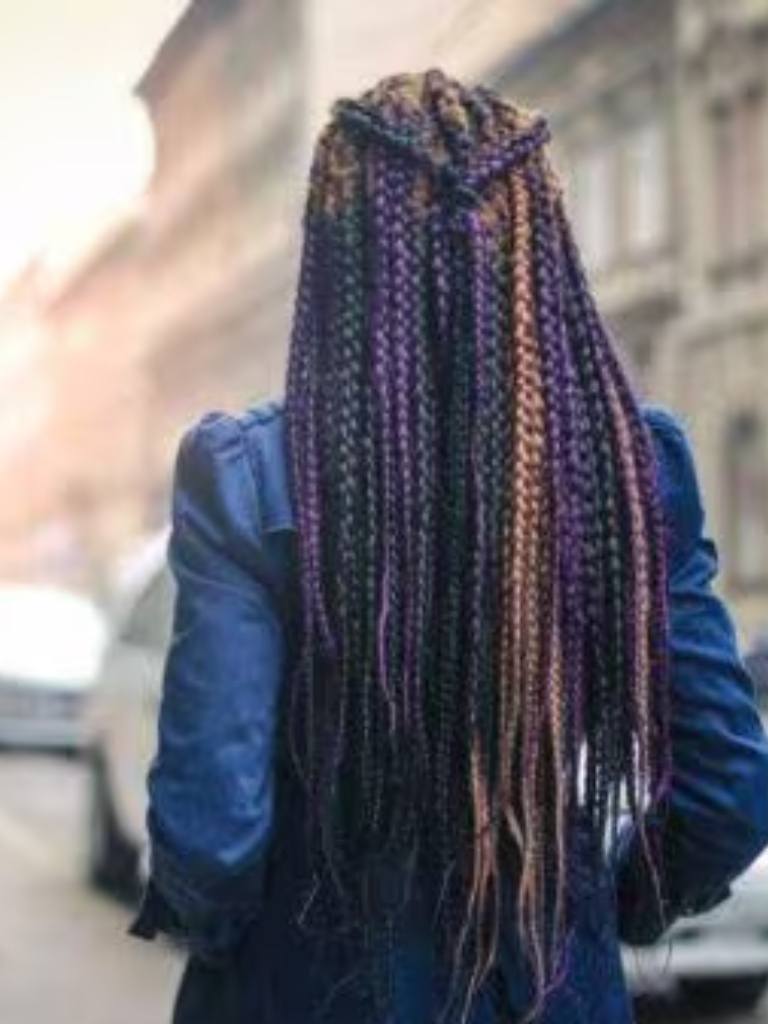 Back view of purple medium box braids