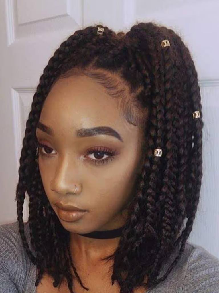 pretty woman with box braids and hair accessories