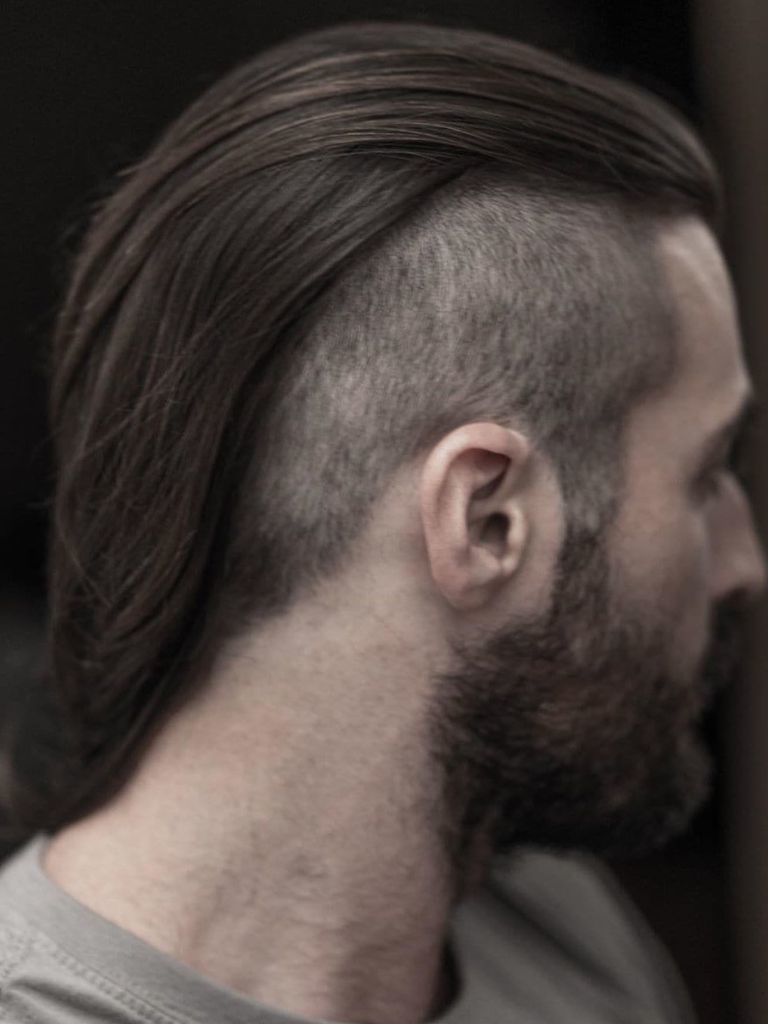 Man with long shaved hair with buzzed undercut