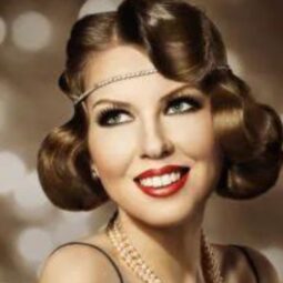 Flapper hairstyles for long hair woman with a 20s inspired hairstyle