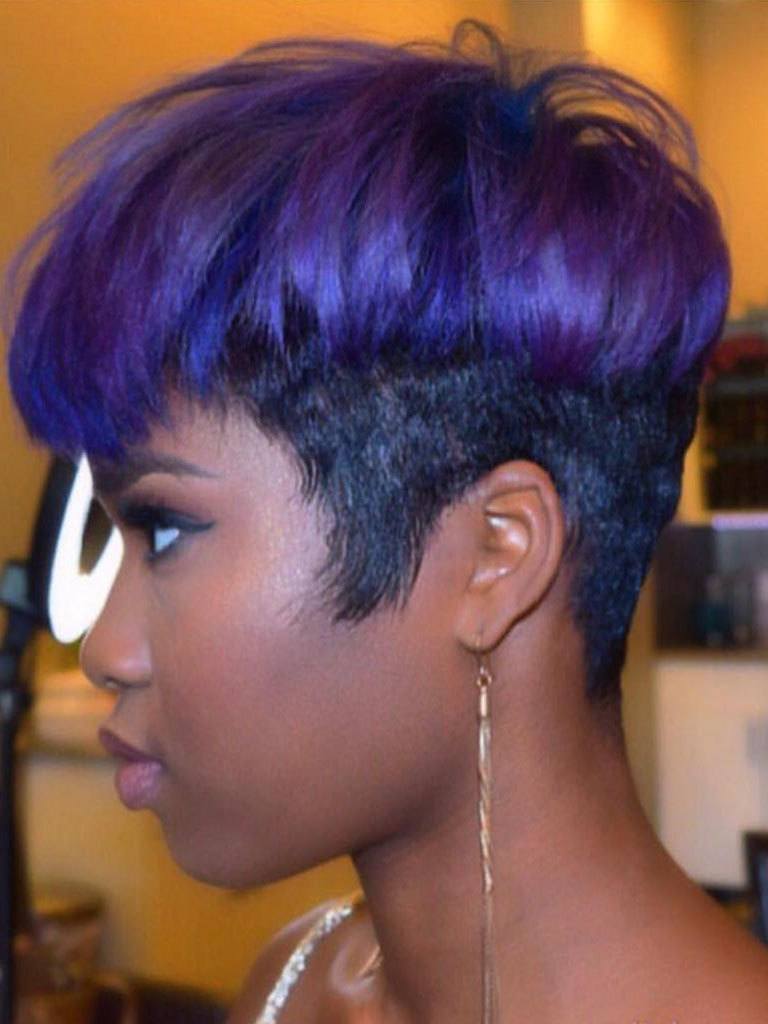 side view of a woman with her hair in a mushroom haircut with purple colour