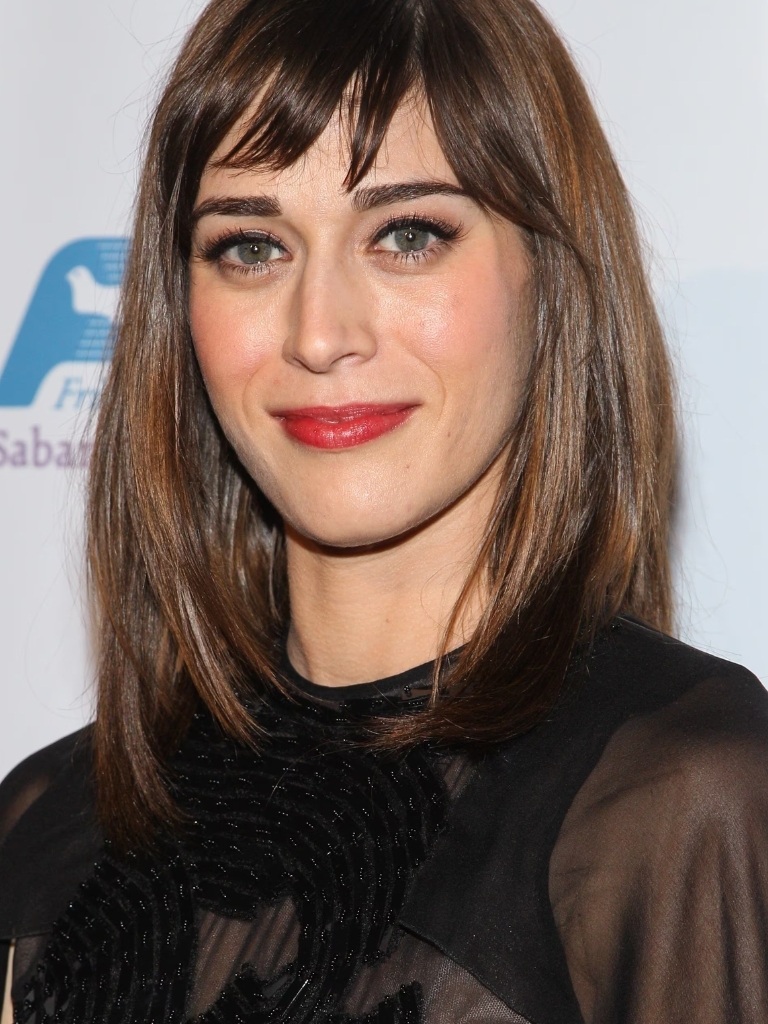 Lizzy Caplan brown straight hair with short bangs
