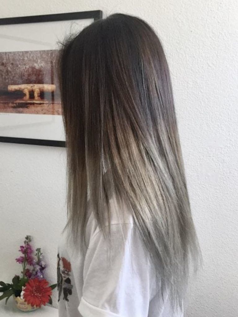 Woman with silver ombre on ash brown hair