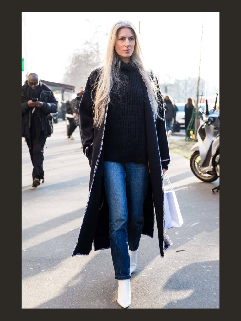 Woman with blonde hair walking on the street