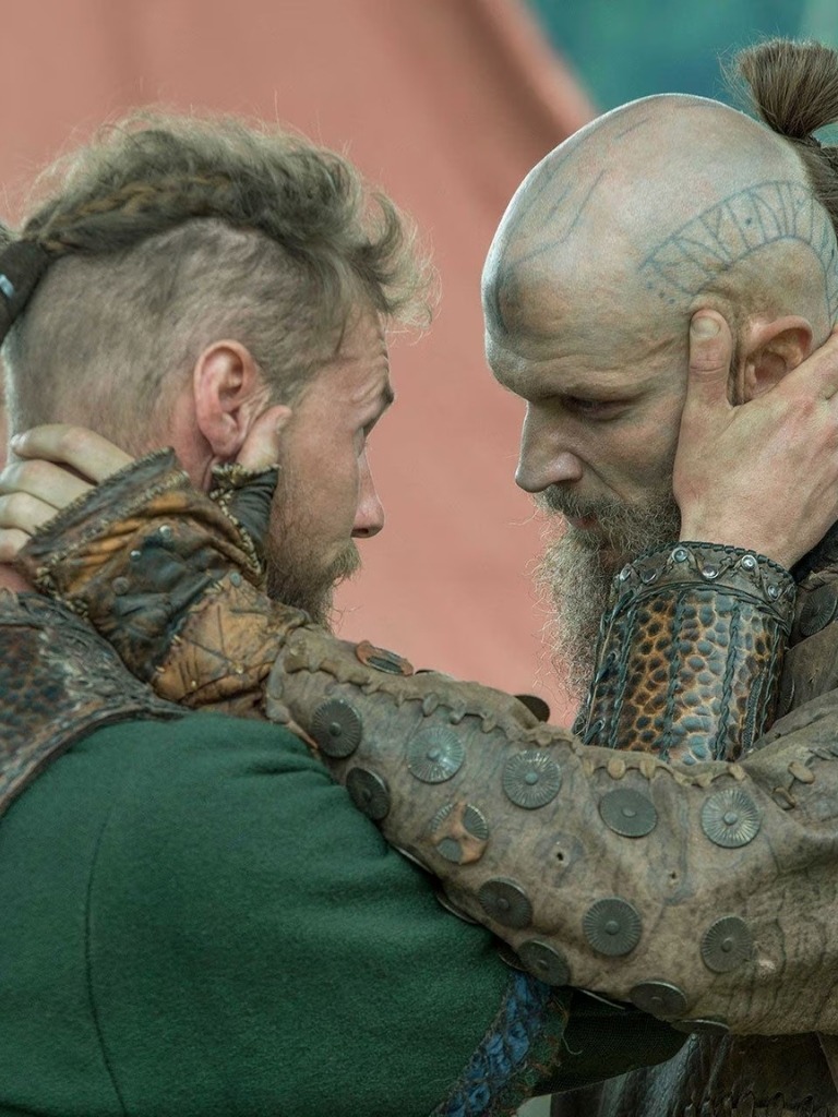 Viking hairstyles: Shot of Ragnar with long braided mohawk ponytail on set