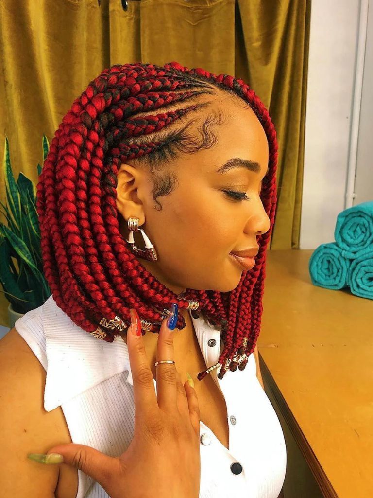 Woman with red cornrow braided box braids
