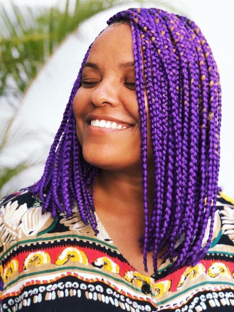 Woman with purple long box braids bob
