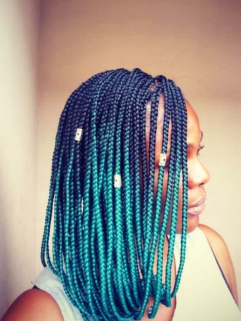 Woman with blue box braids bob