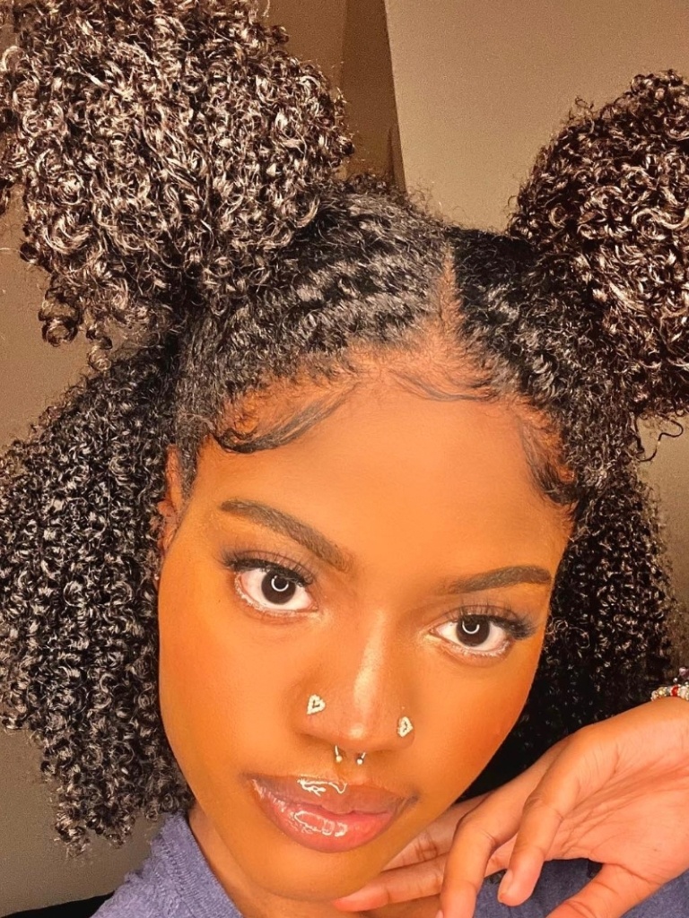 voluminous afro space buns