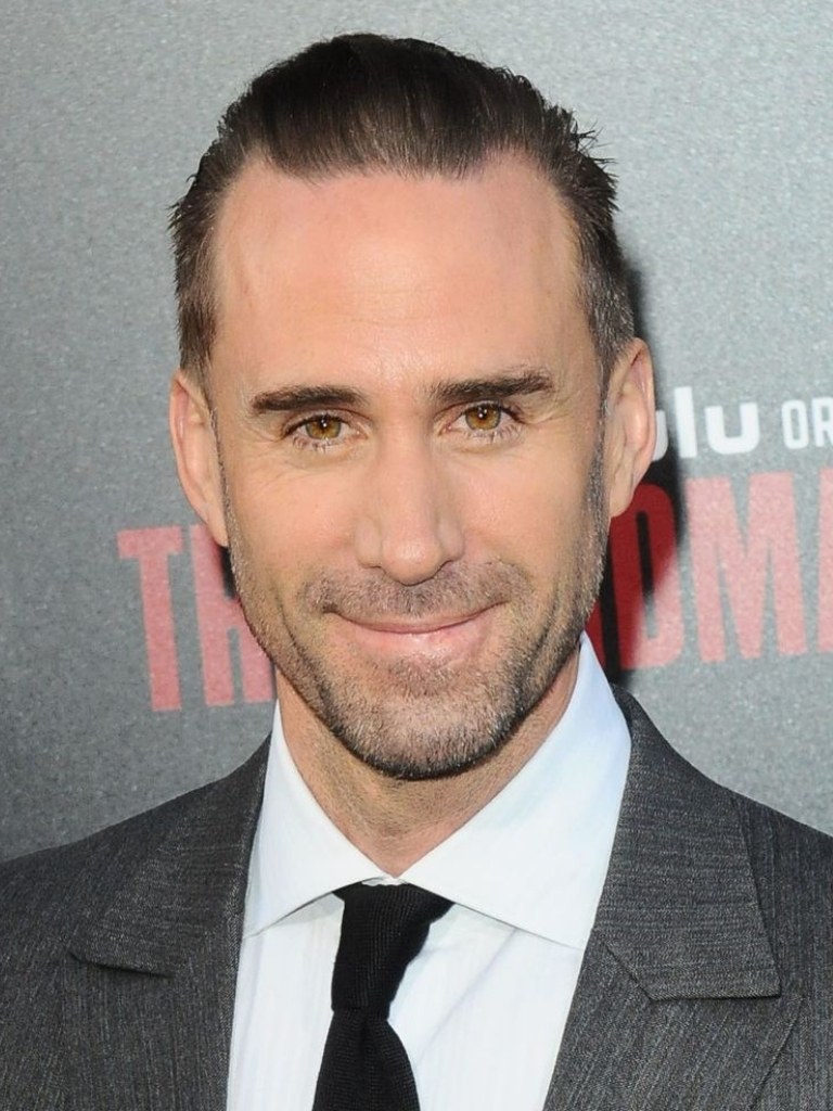 Hairstyles for receding hairline: Joseph Fiennes with dark combed back hair