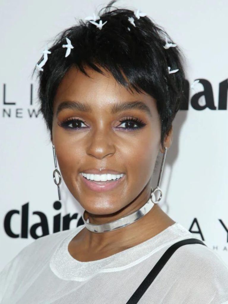 Janelle Monae wearing dark brown pixie cut