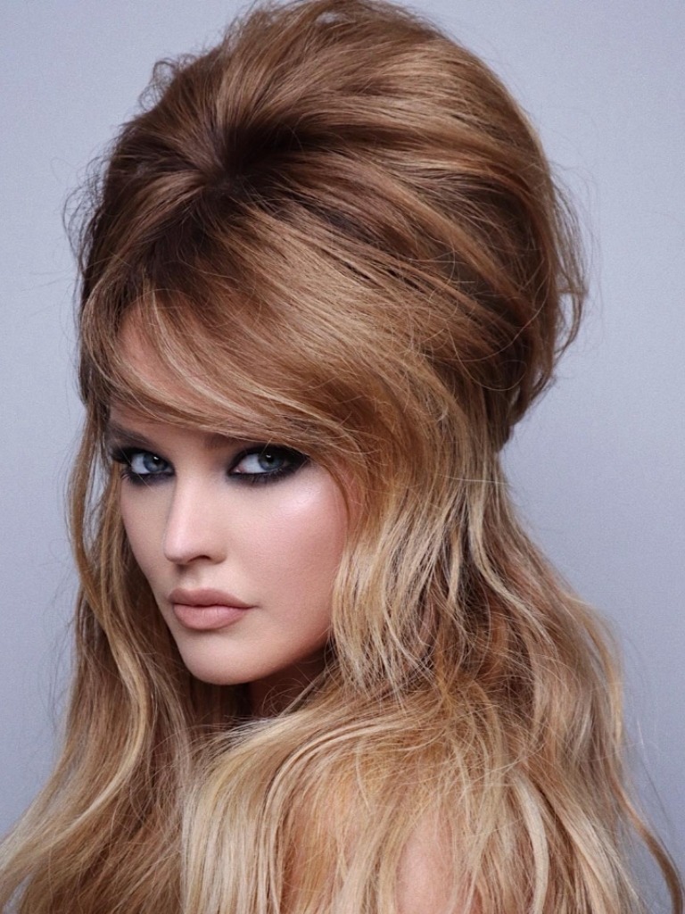 Woman with dirty blonde bombshell hairstyle