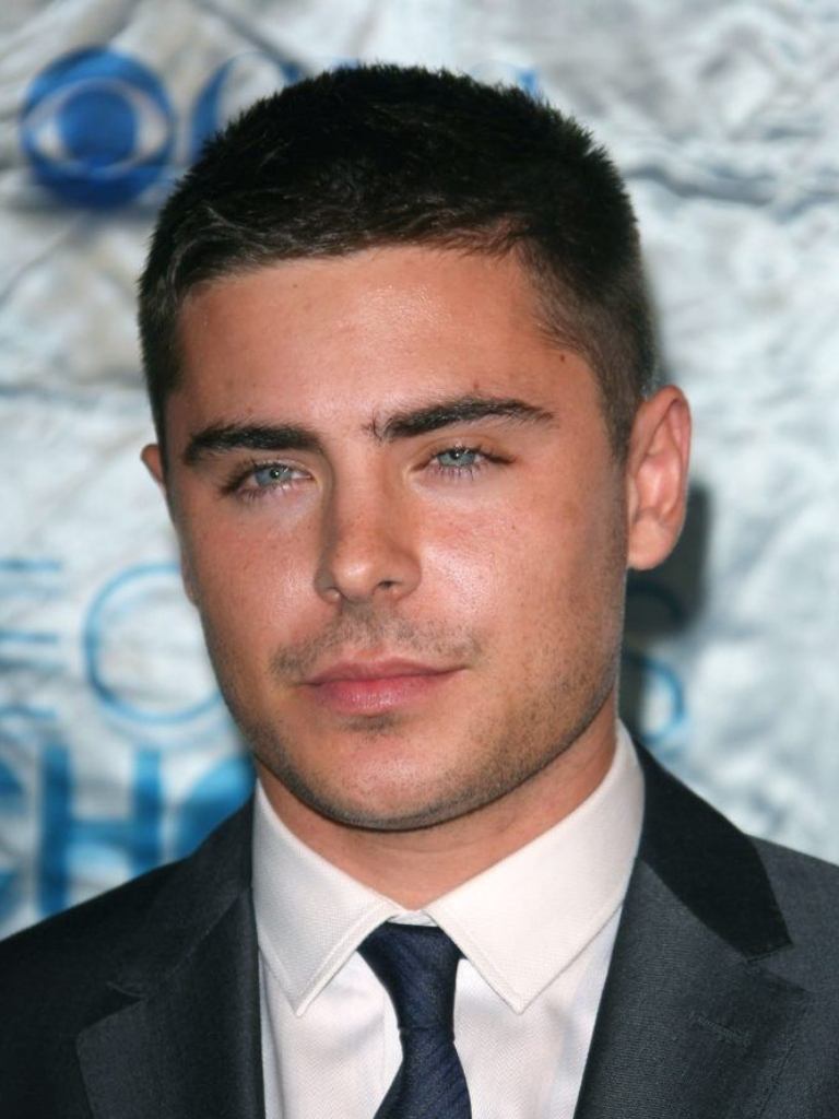 actor zac efron with a buzz cut haircut