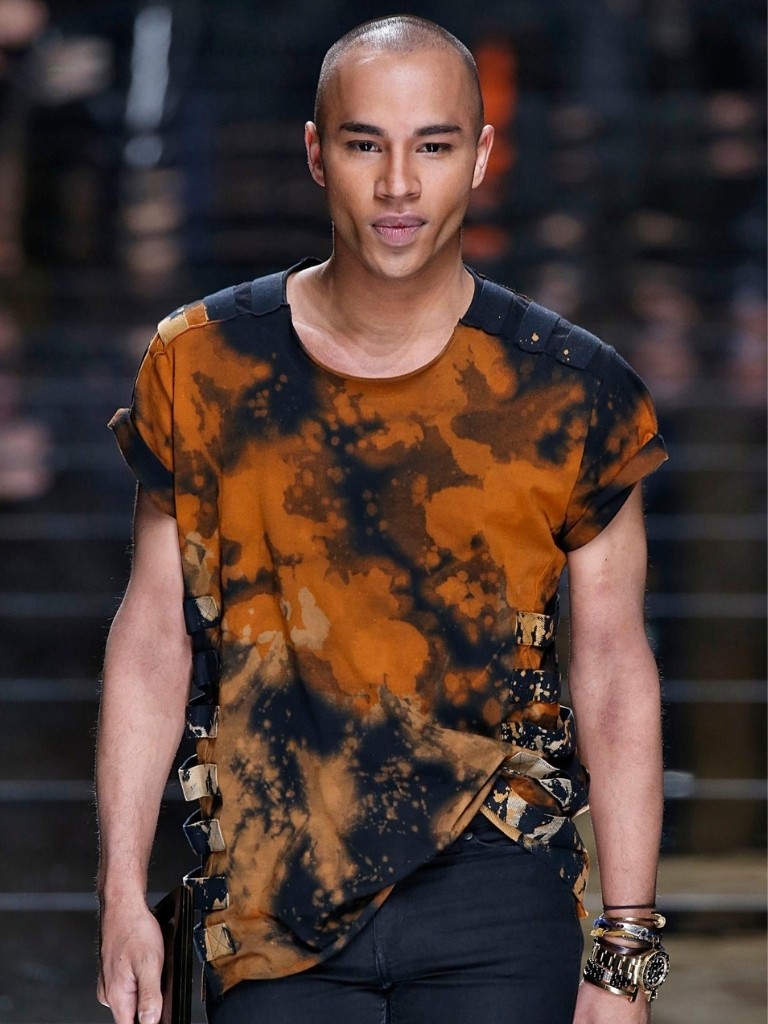 olivier rousteing at the balmain fashion show in paris with shaved buzz cut hair