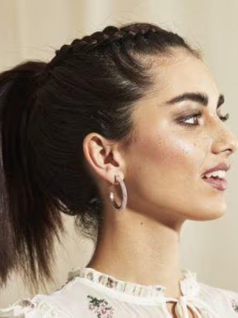 Woman with shoulder length side braid