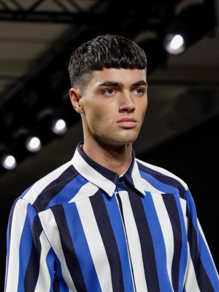 Male runway model with brown french crop