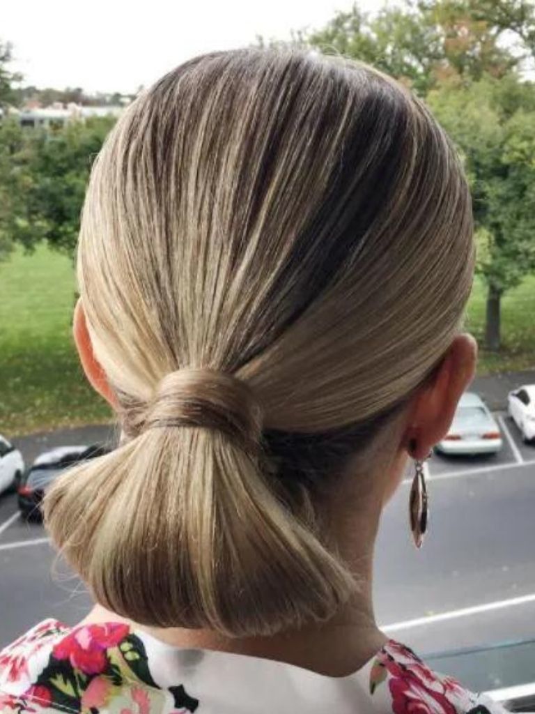 Low tuck hairstyle