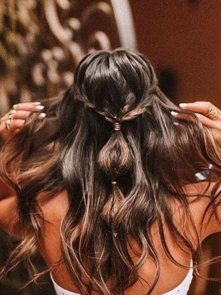 Woman with half-up bridal bubble hair