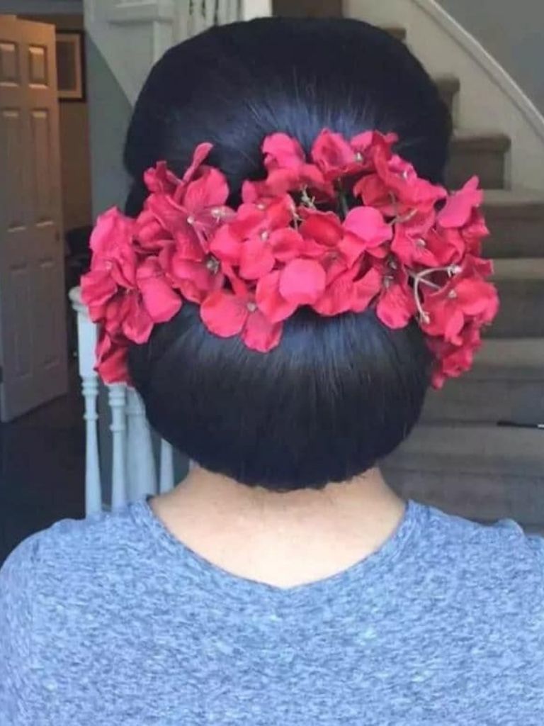 Floral chignon bridal wedding hairstyle