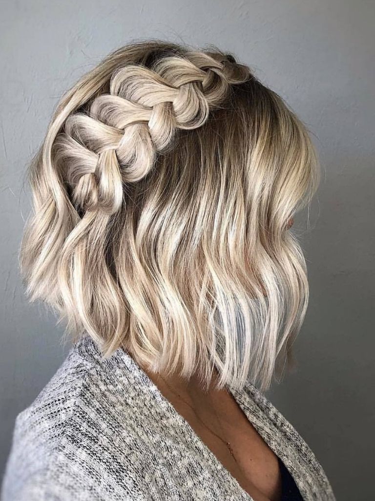 Pinned back Dutch braid bridal hairstyle